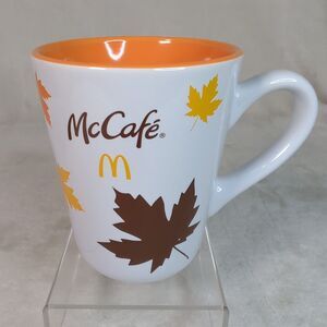 McDonalds McCafe Ceramic Coffee Cup Fall Leaves Classic Logo 12 oz White Mug